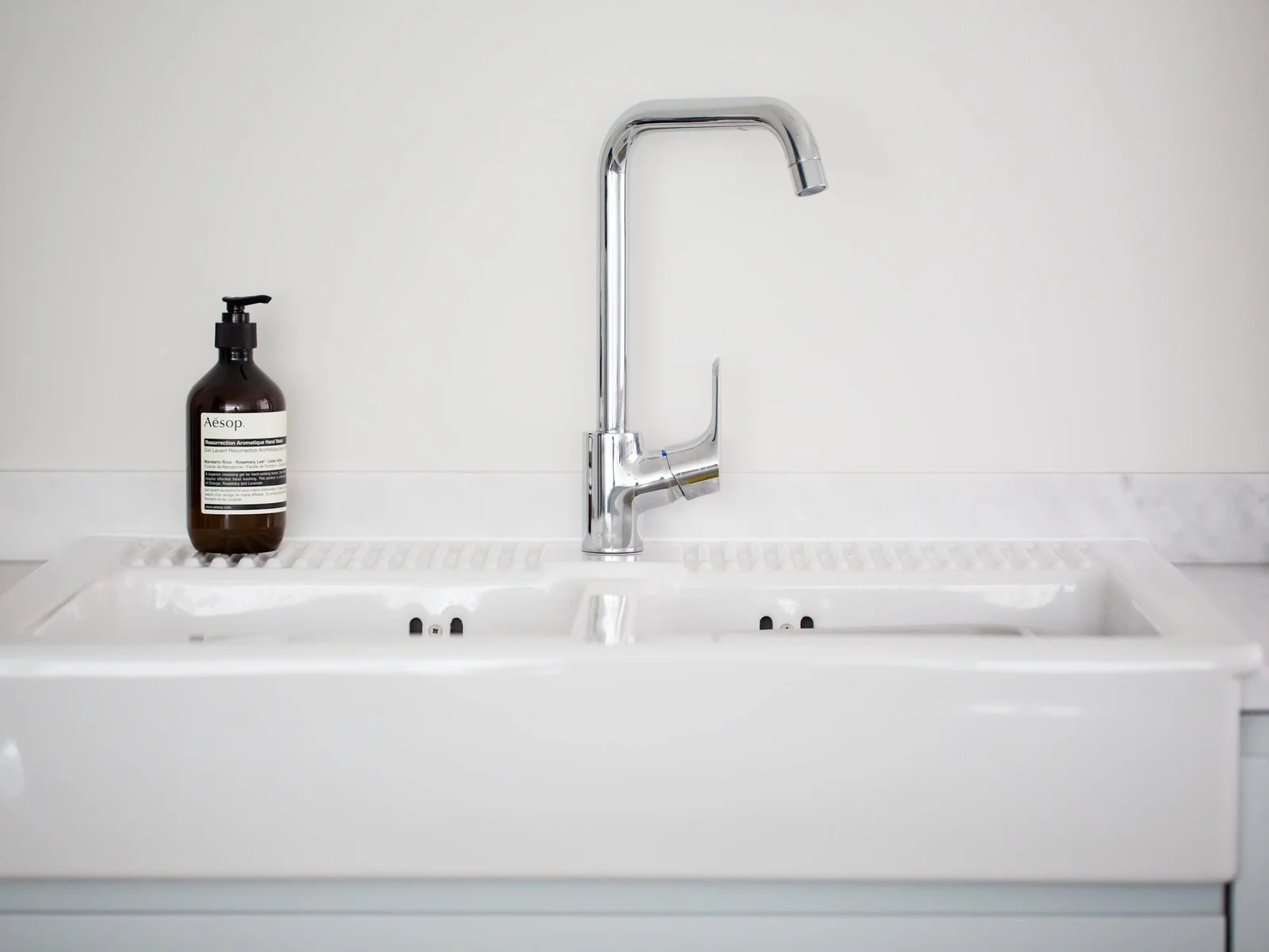 The kitchen has a large butler sink.