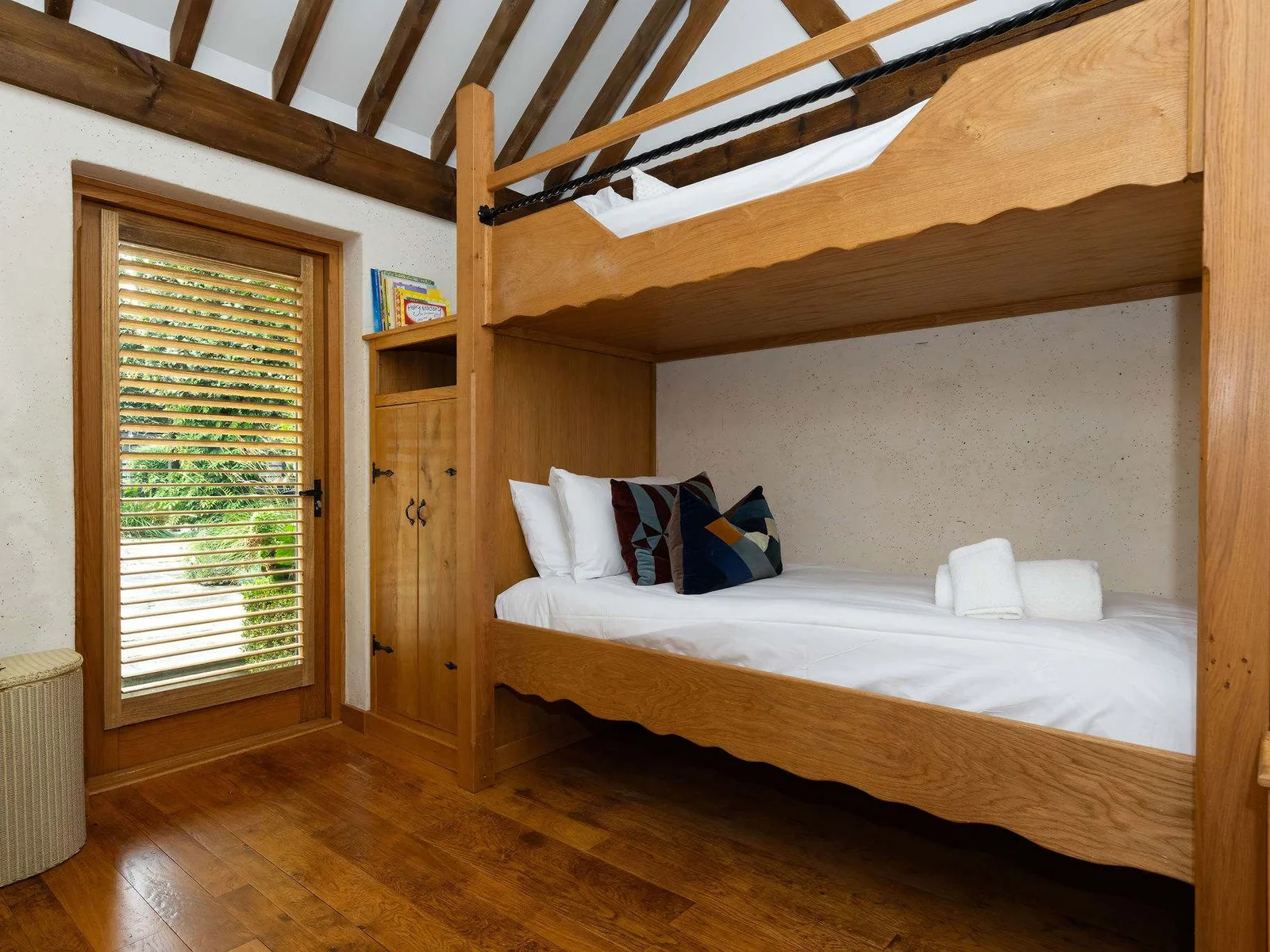 Characterful built-in bunk beds create a cosy and fun sleeping space.