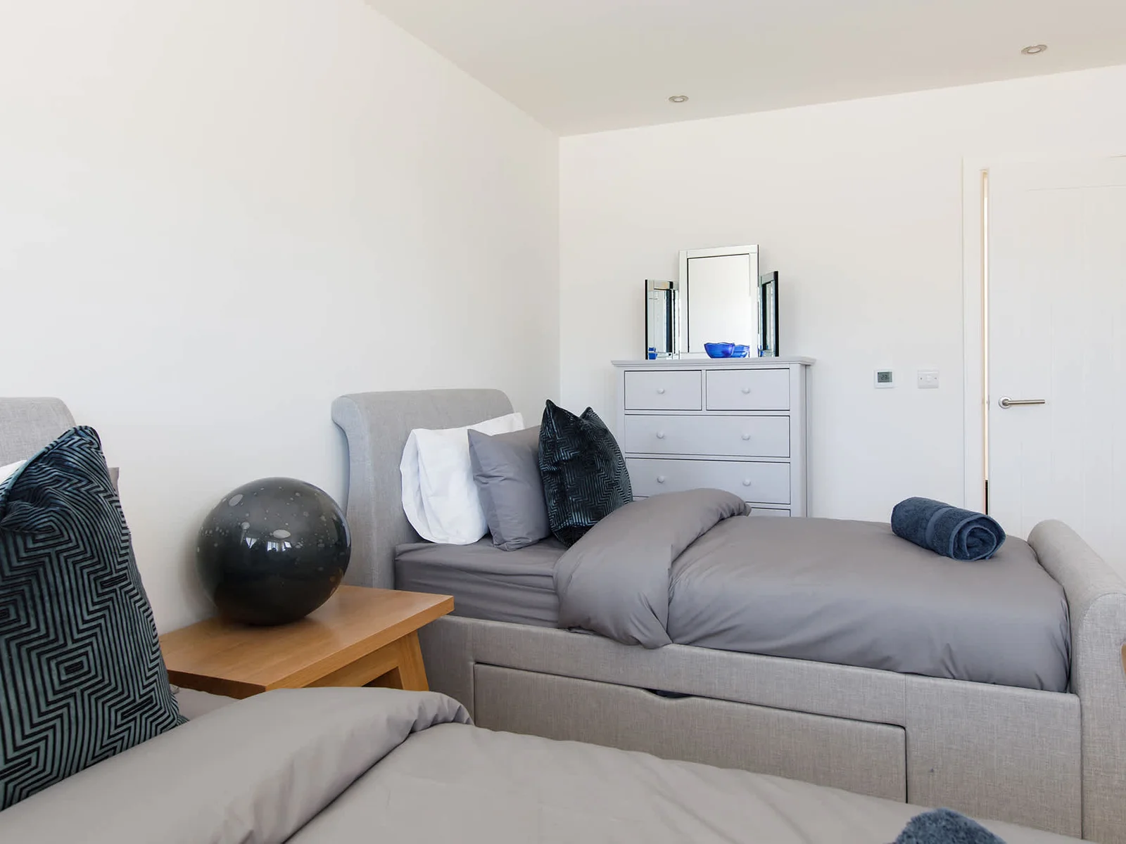 The rooms have spacious draws for all your belongings and side tables.
