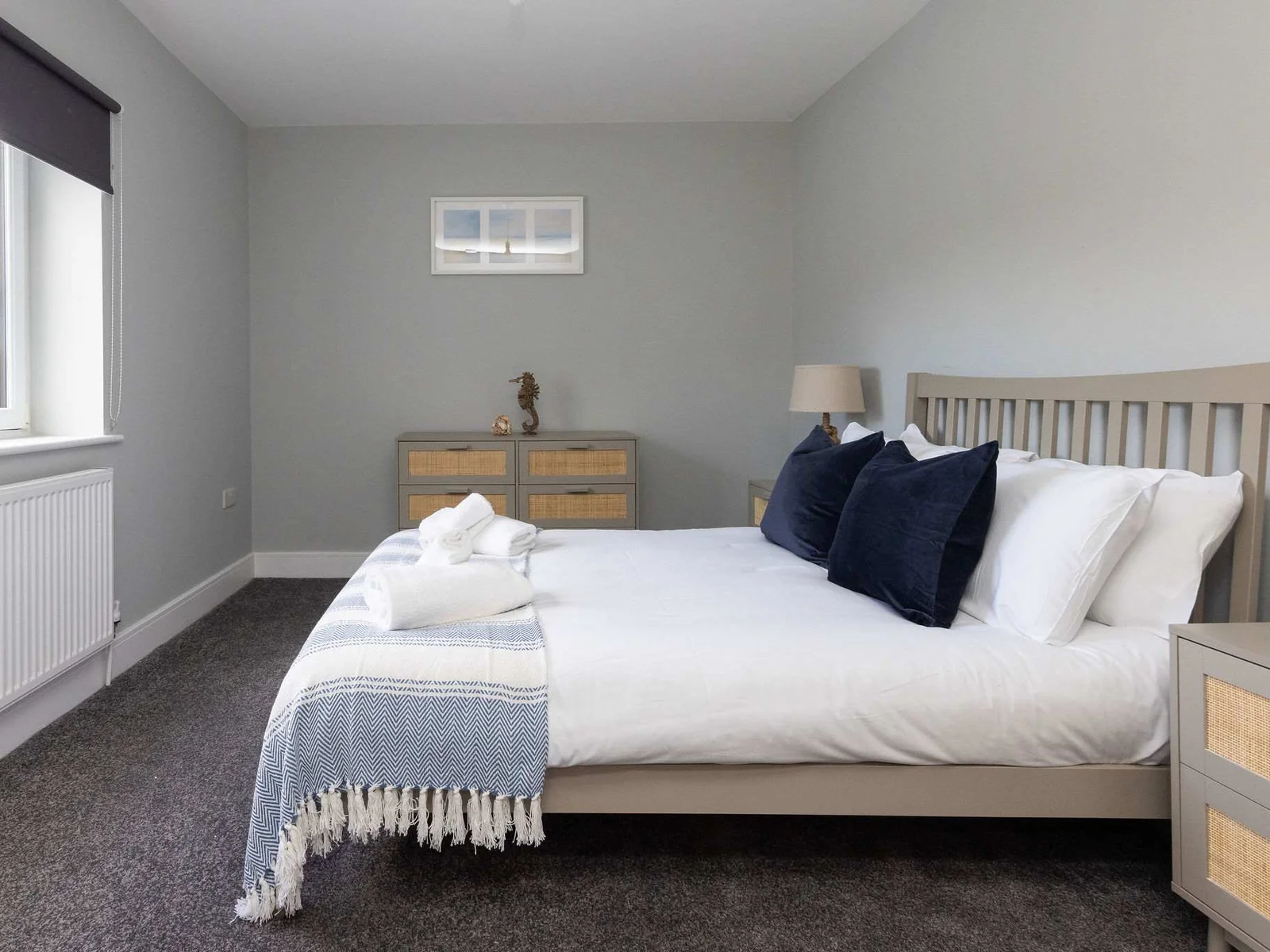 A bright, airy room with blackout blinds for a restful sleep.