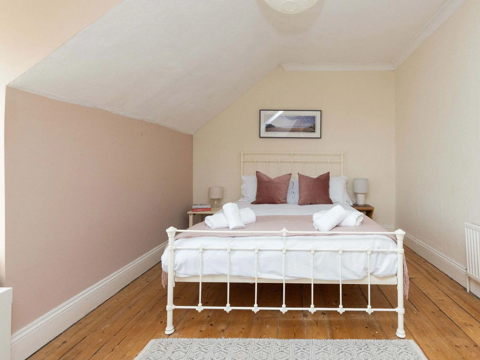 Enjoy this homely King bedroom with its quality linen.