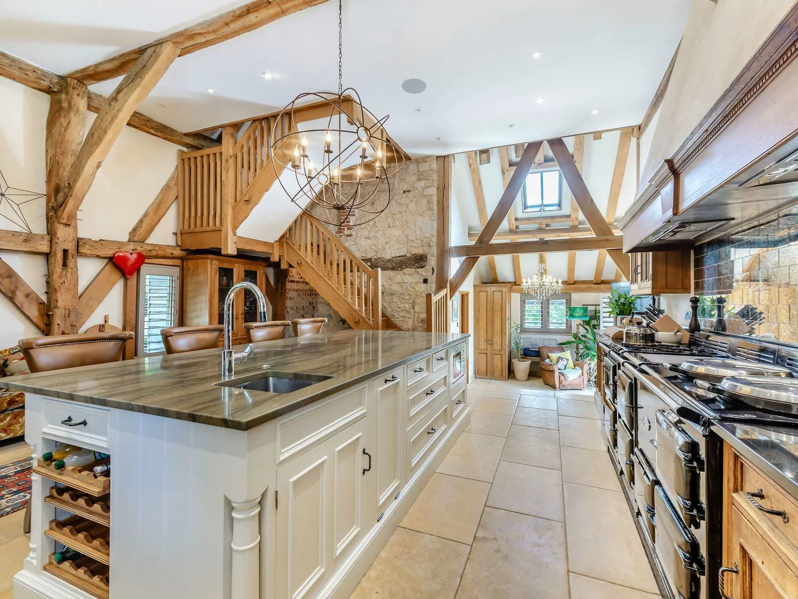 A sociable country kitchen with generous island seating and beautiful original timberwork