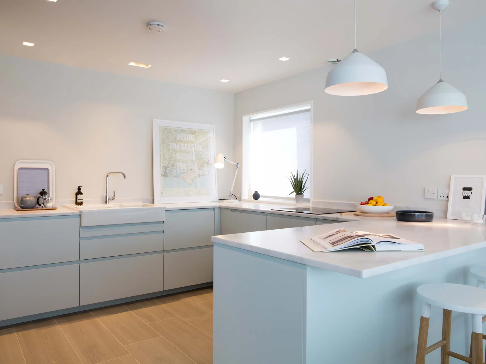 Cook up a storm in the home's fully-equipped kitchen with spacious countertops and breakfast bar.