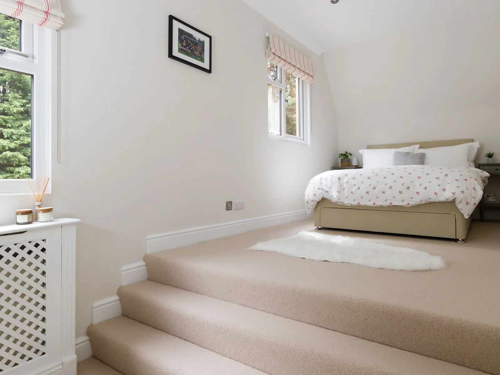 This gorgeous double room features steps up to the bed.