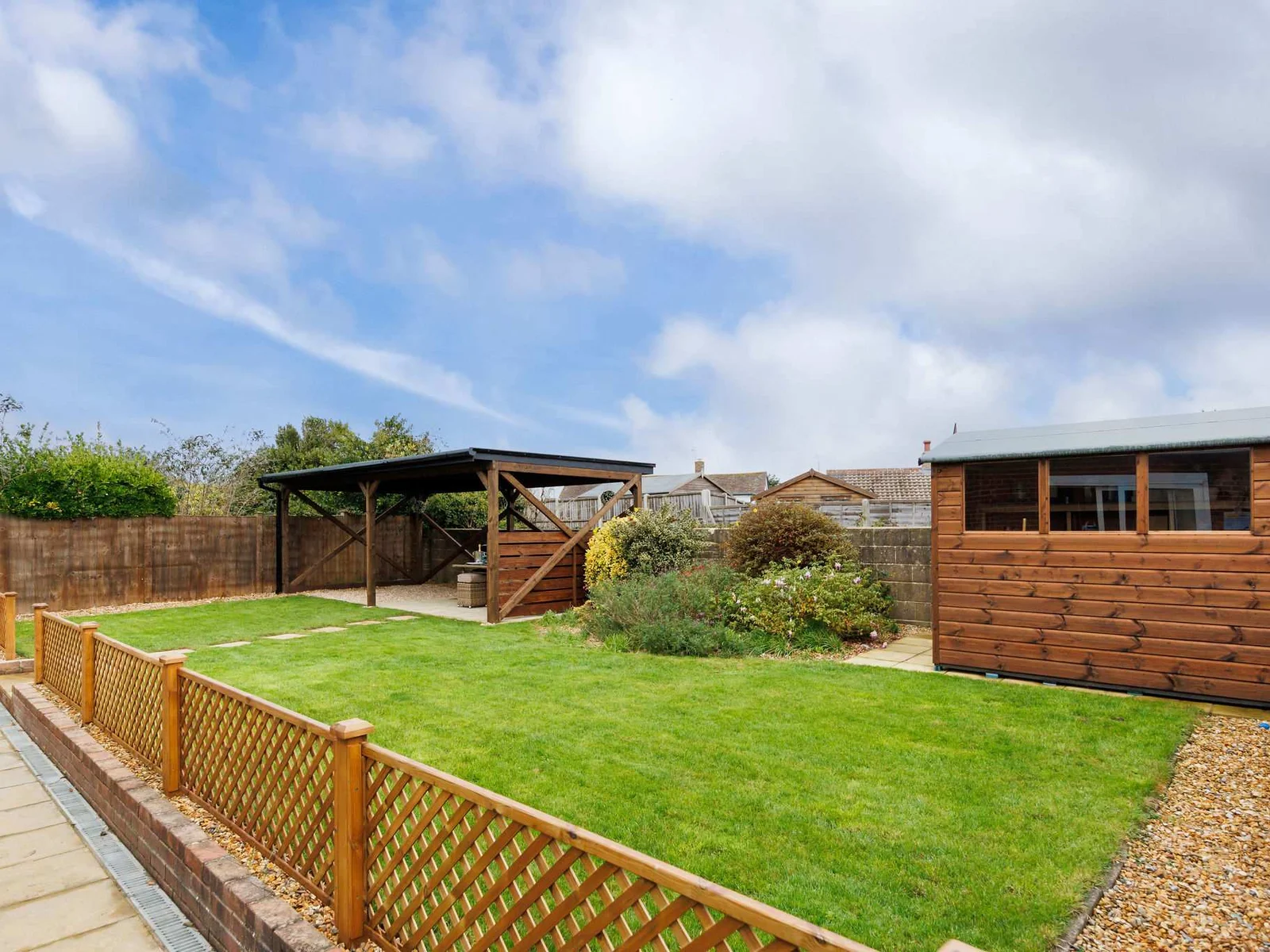 The garden is a good size, with a lovely lawn space for games.