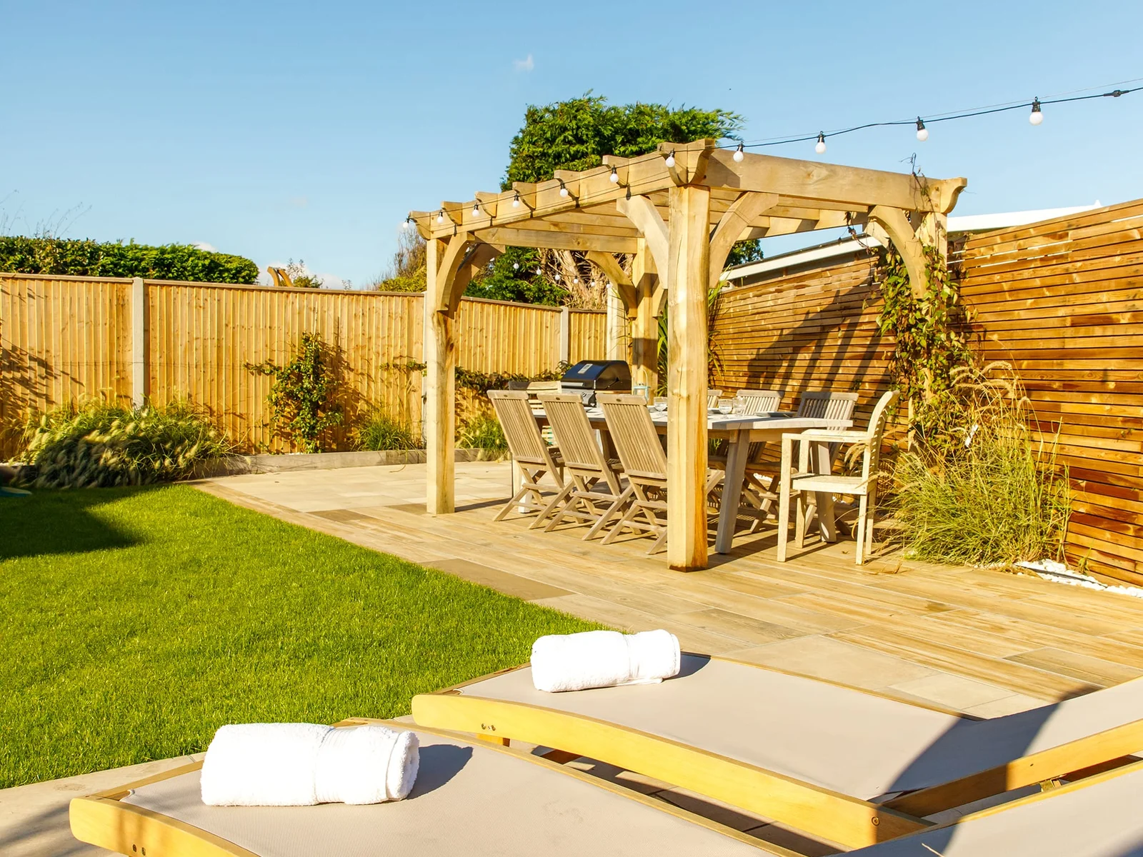Take the weight off your feet and soak up some sunshine on the loungers.