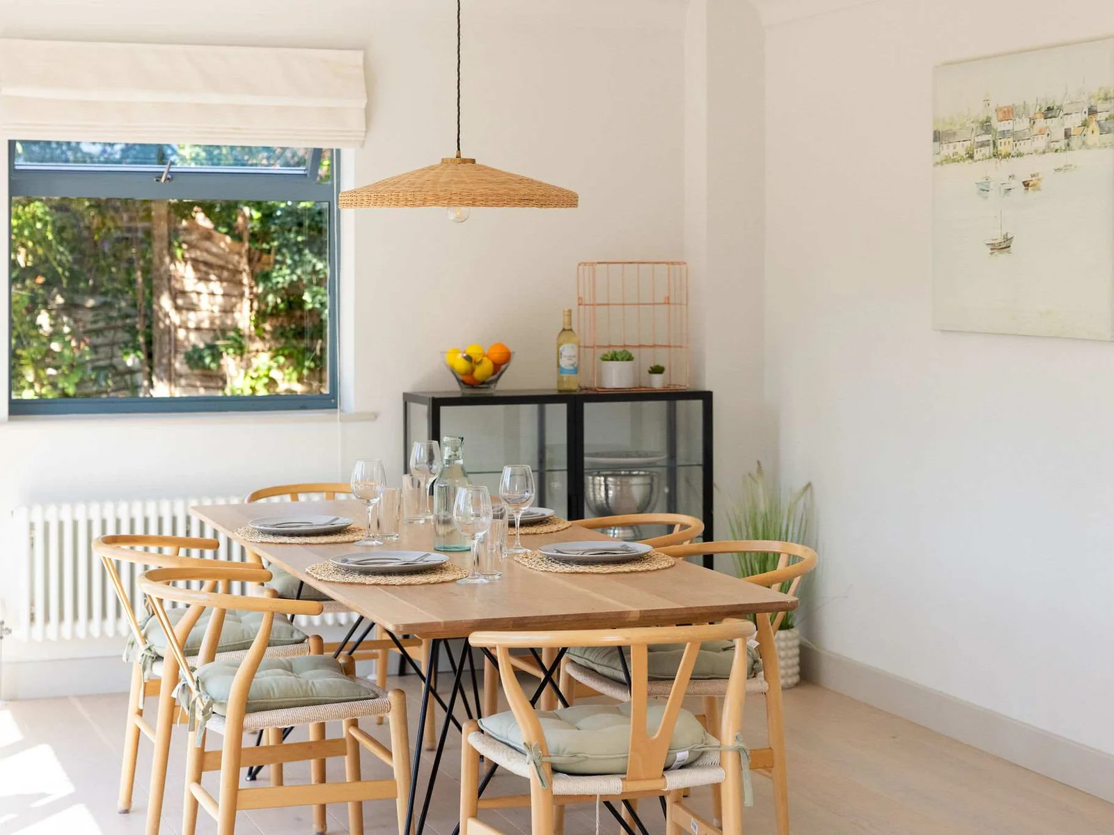 Dining Area - Our contemporary open-plan dining space, with a stylish table comfortably seating six — perfect for relaxed breakfasts, long lunches and memorable meals together.