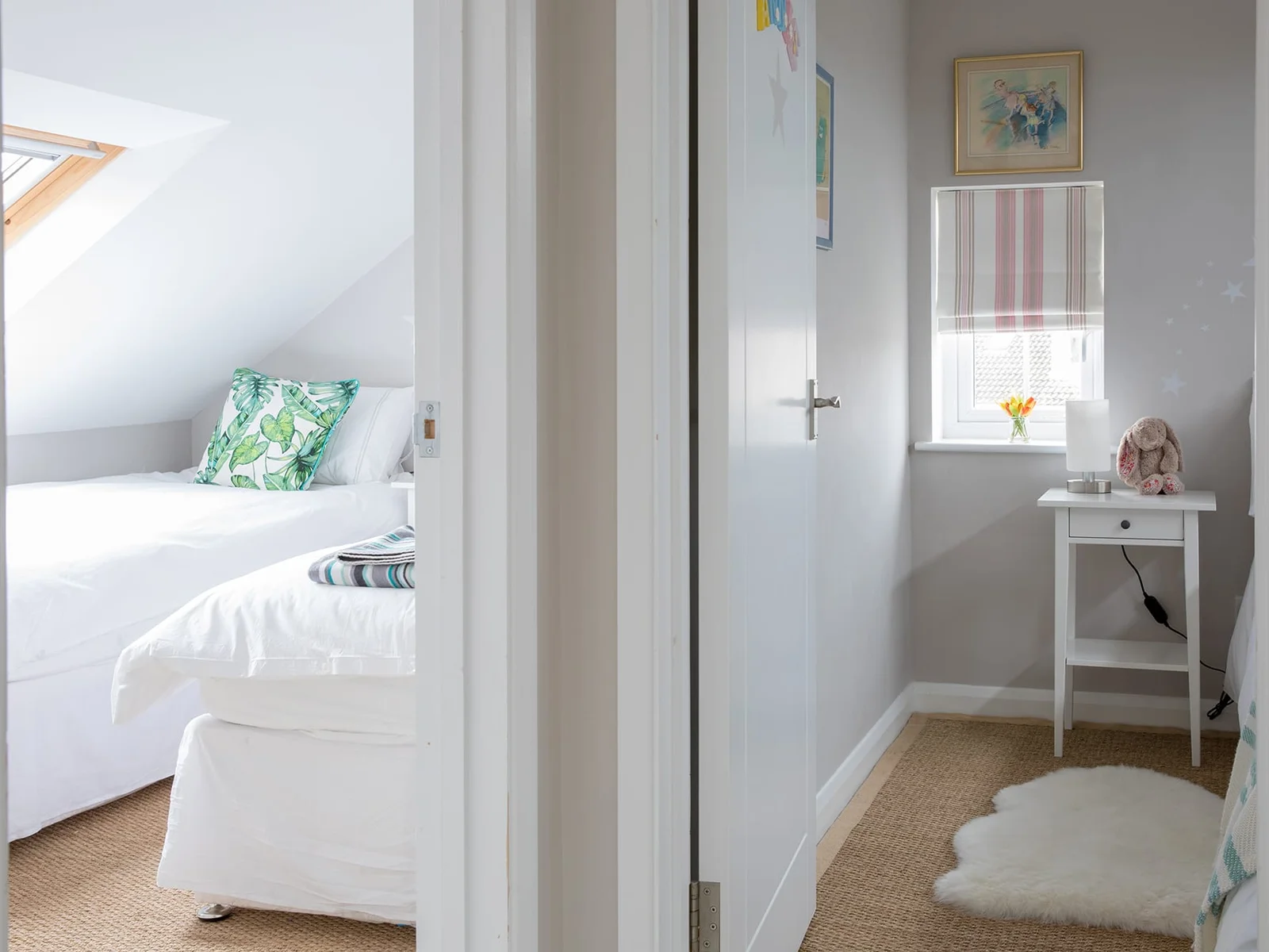 Spacious hallway connects the three bedrooms on the upper floor.
