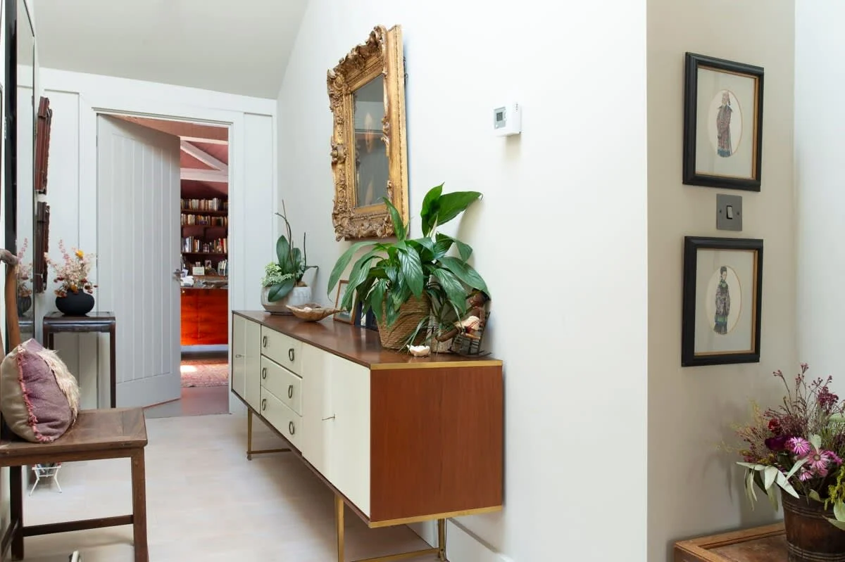 The home is tastefully furnished with interesting and individual pieces.