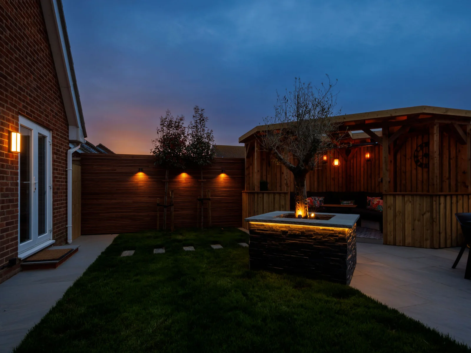 As the sunsets, the outdoor area's gentle lighting creates a beautiful space to socialise.