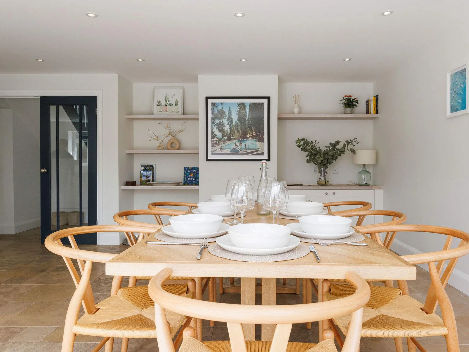 A dining table to seat 8 guests, perfect for a dinner party.