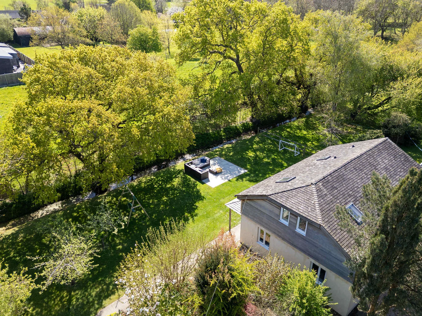 The home is rural and secluded, with plenty of parking and large garden.