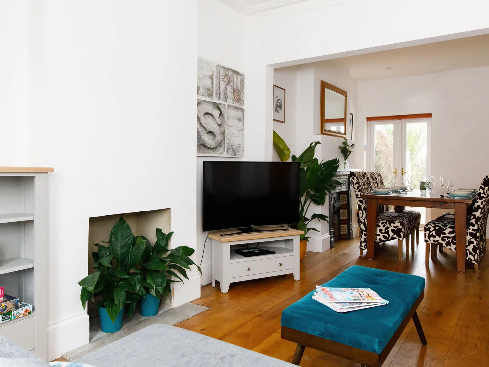 The lounge and dining area combine to make one large entertaining area that is ideal for gathering.