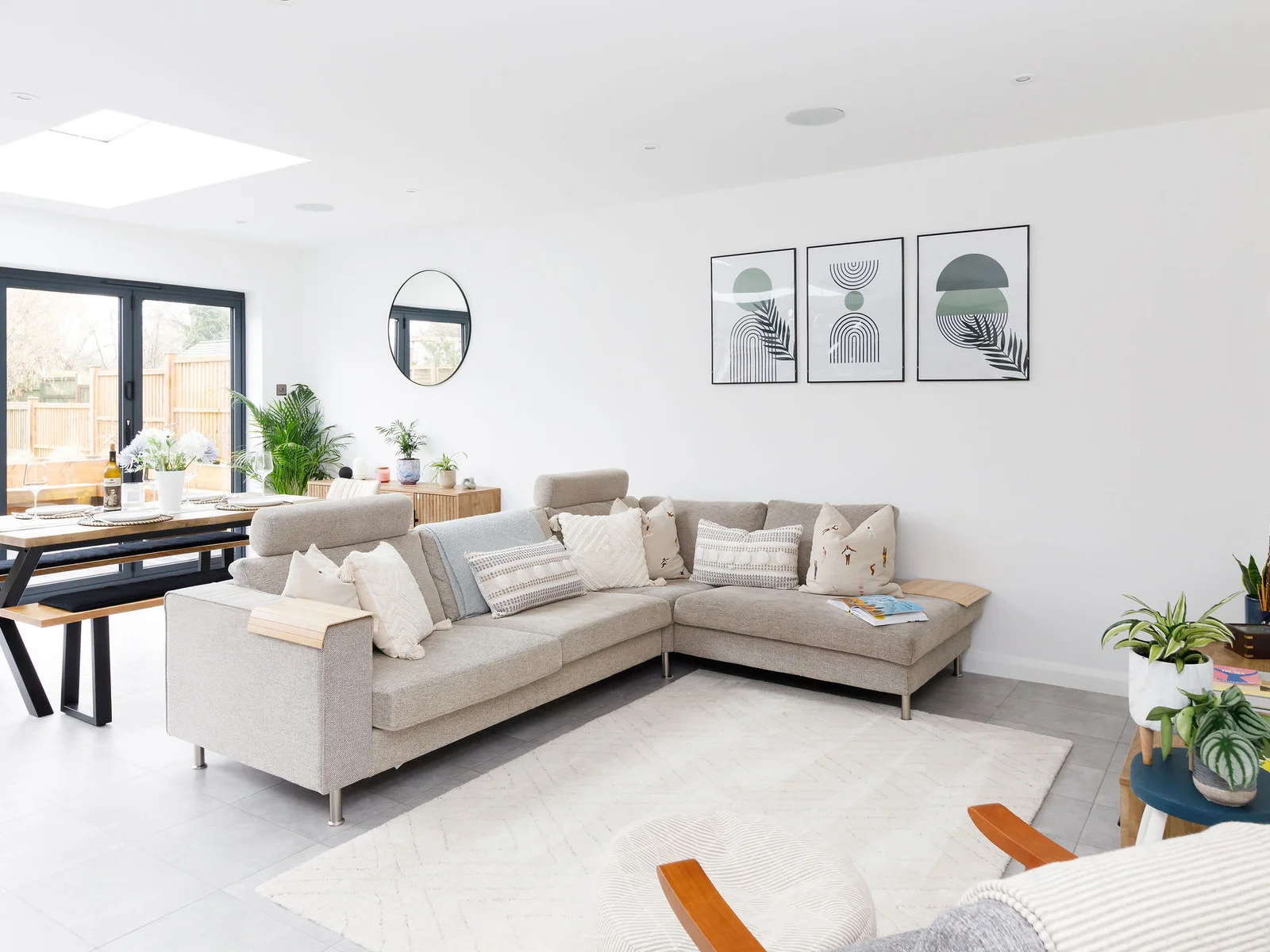 Cosy down on the large corner sofa and relax amongst comfy cushions and throws.
