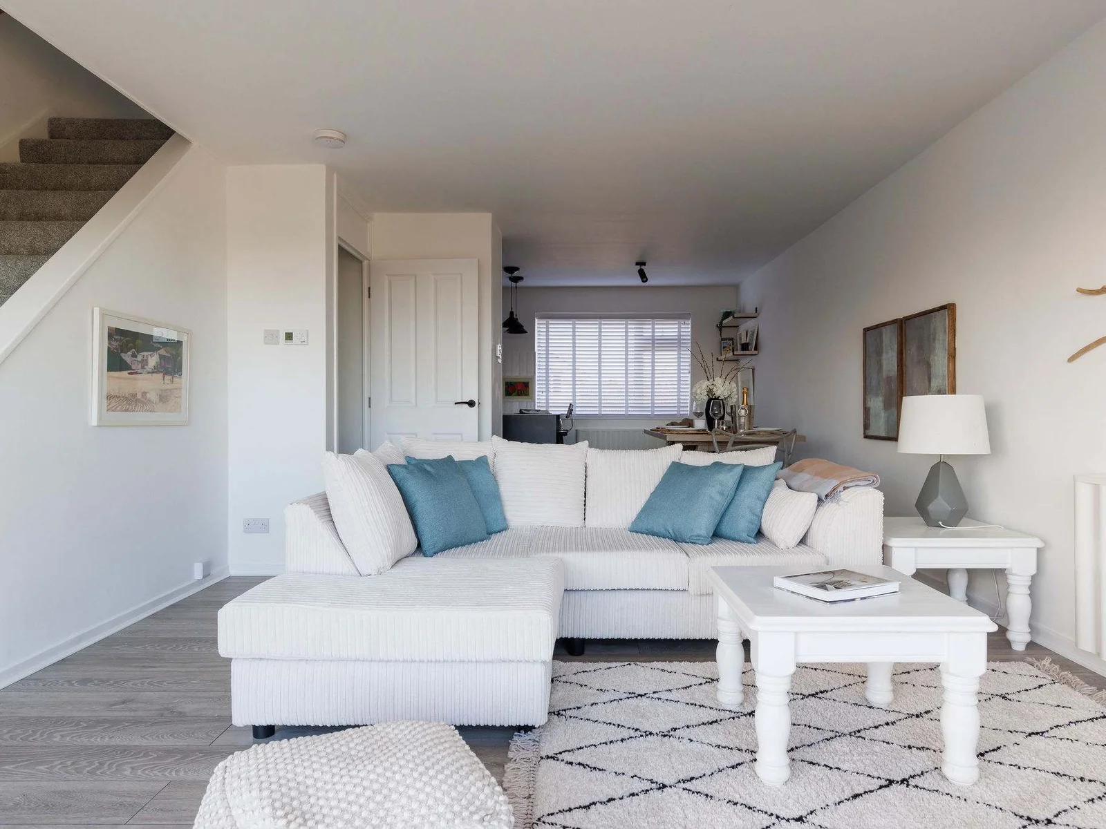 Cozy living space with soft furnishings and natural light