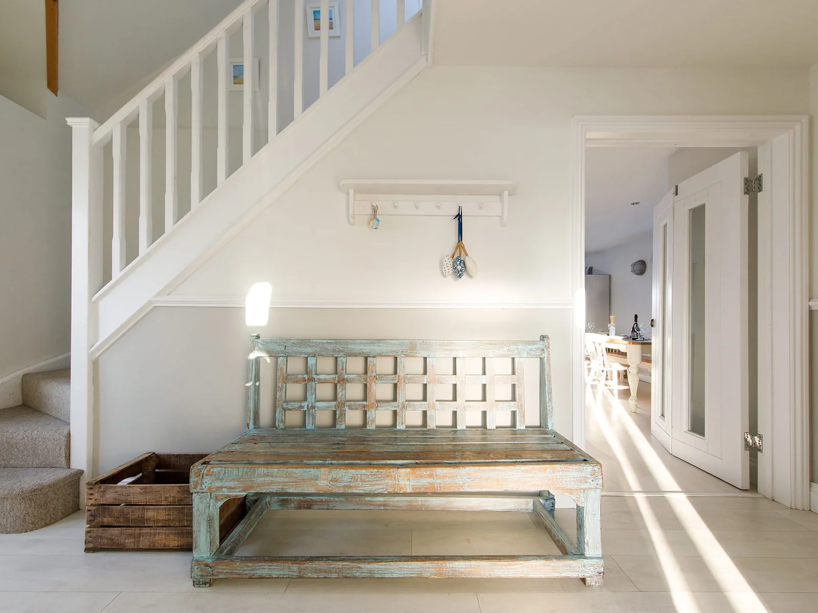 There is handy seating in the hall, great for getting shoes on and ready to head down to the beach!