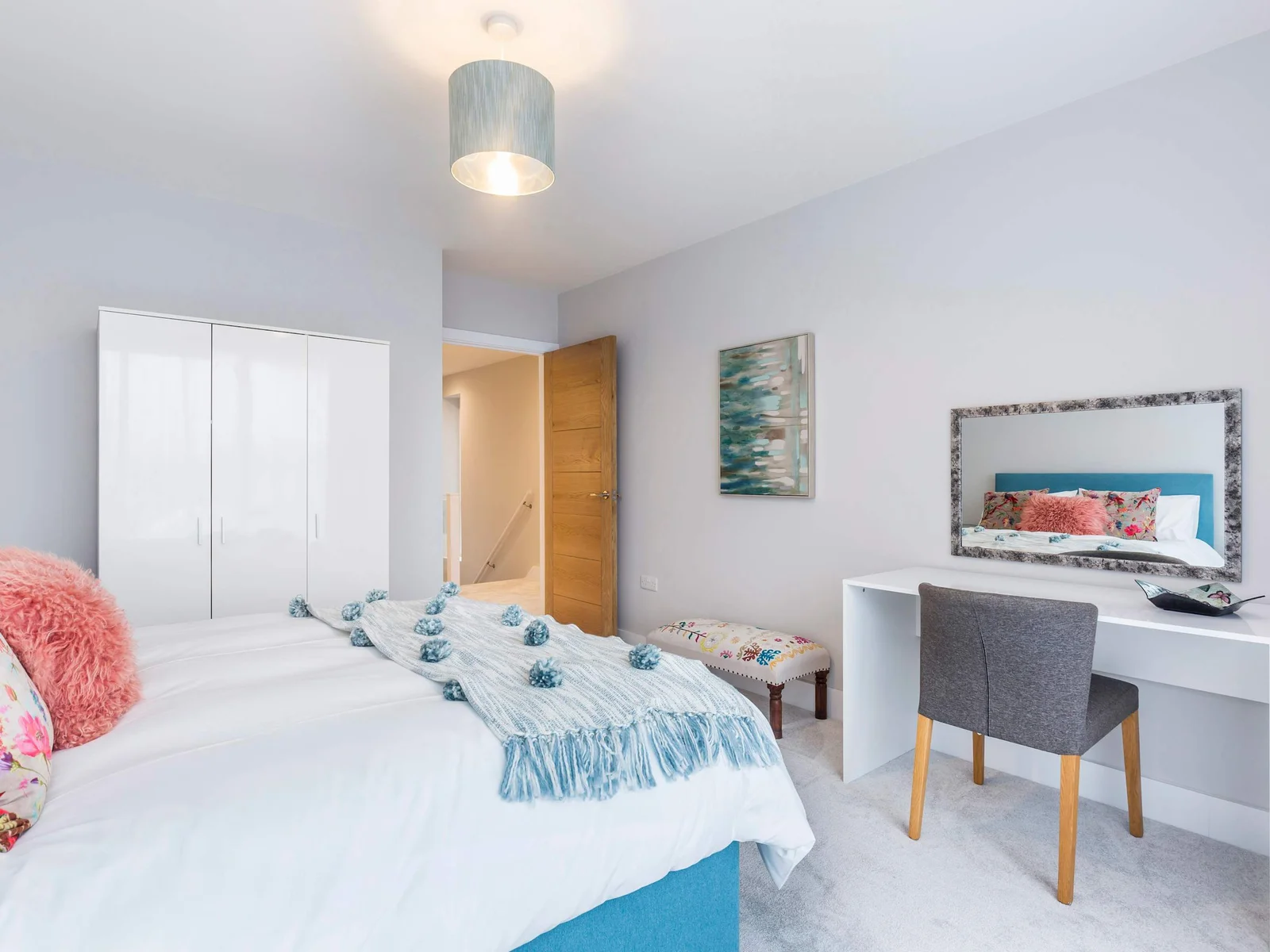 More style in this double bedroom w king bed