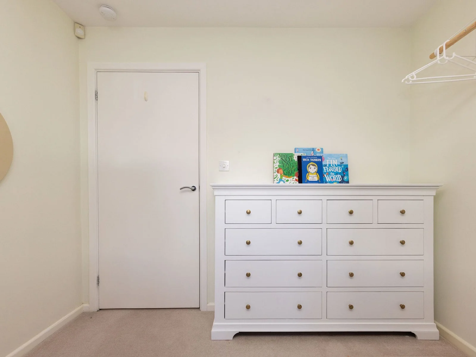 Practical chest of drawers and hanging space for little guests