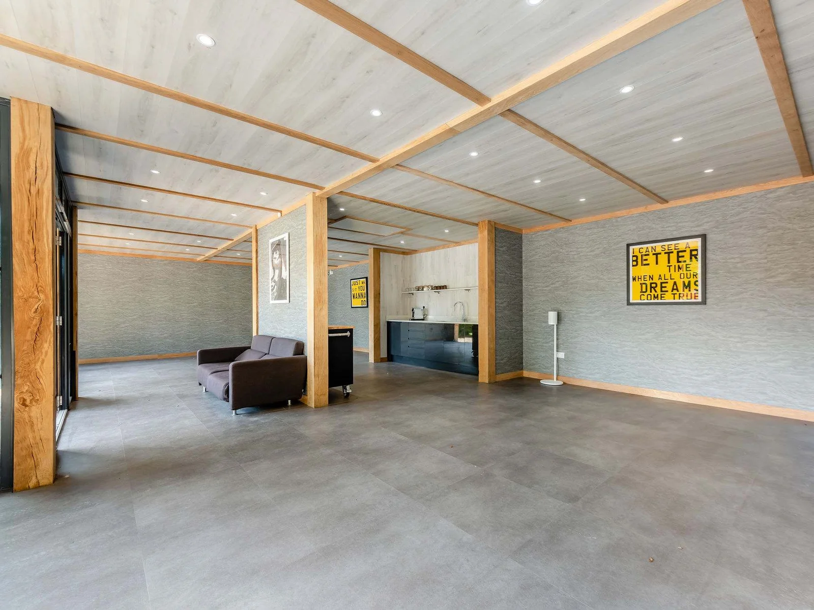 The garage can double as an additional entertaining area with plenty of room for the group