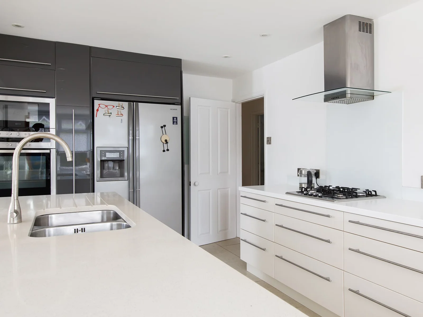 You have plenty of cupboard space and a huge American fridge freezer.