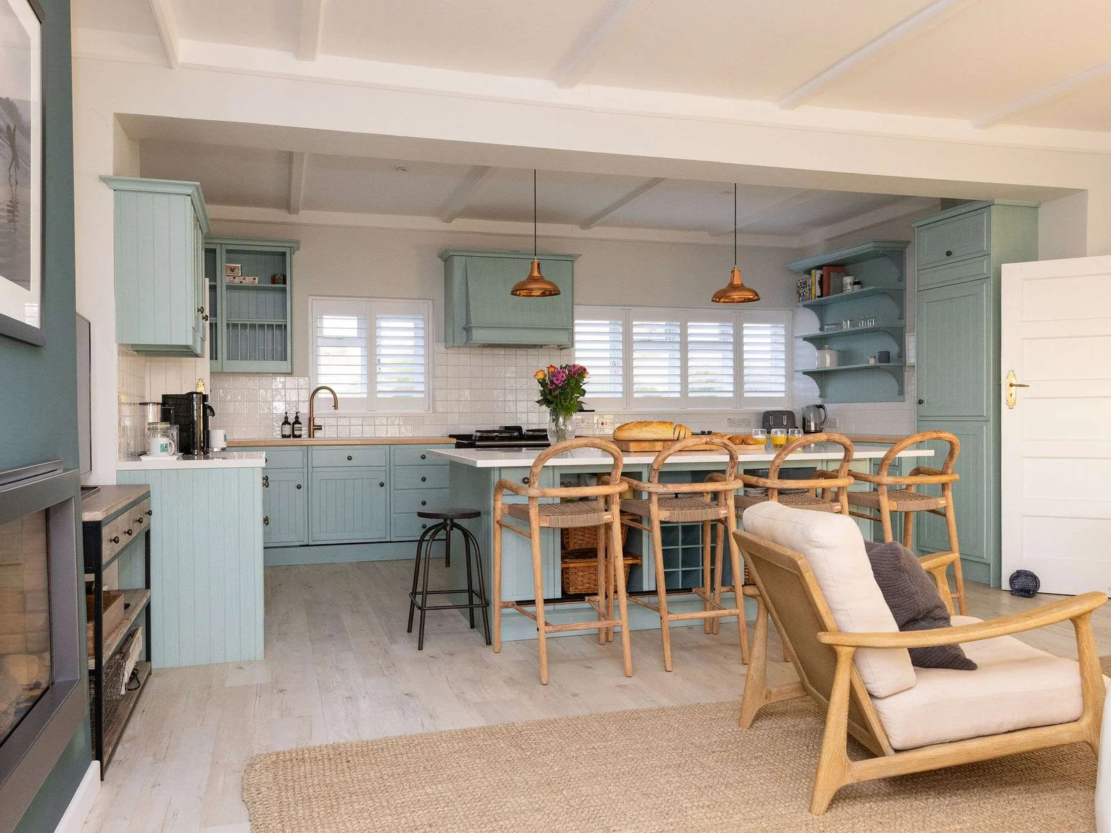 Spacious open-plan kitchen with range cooker.