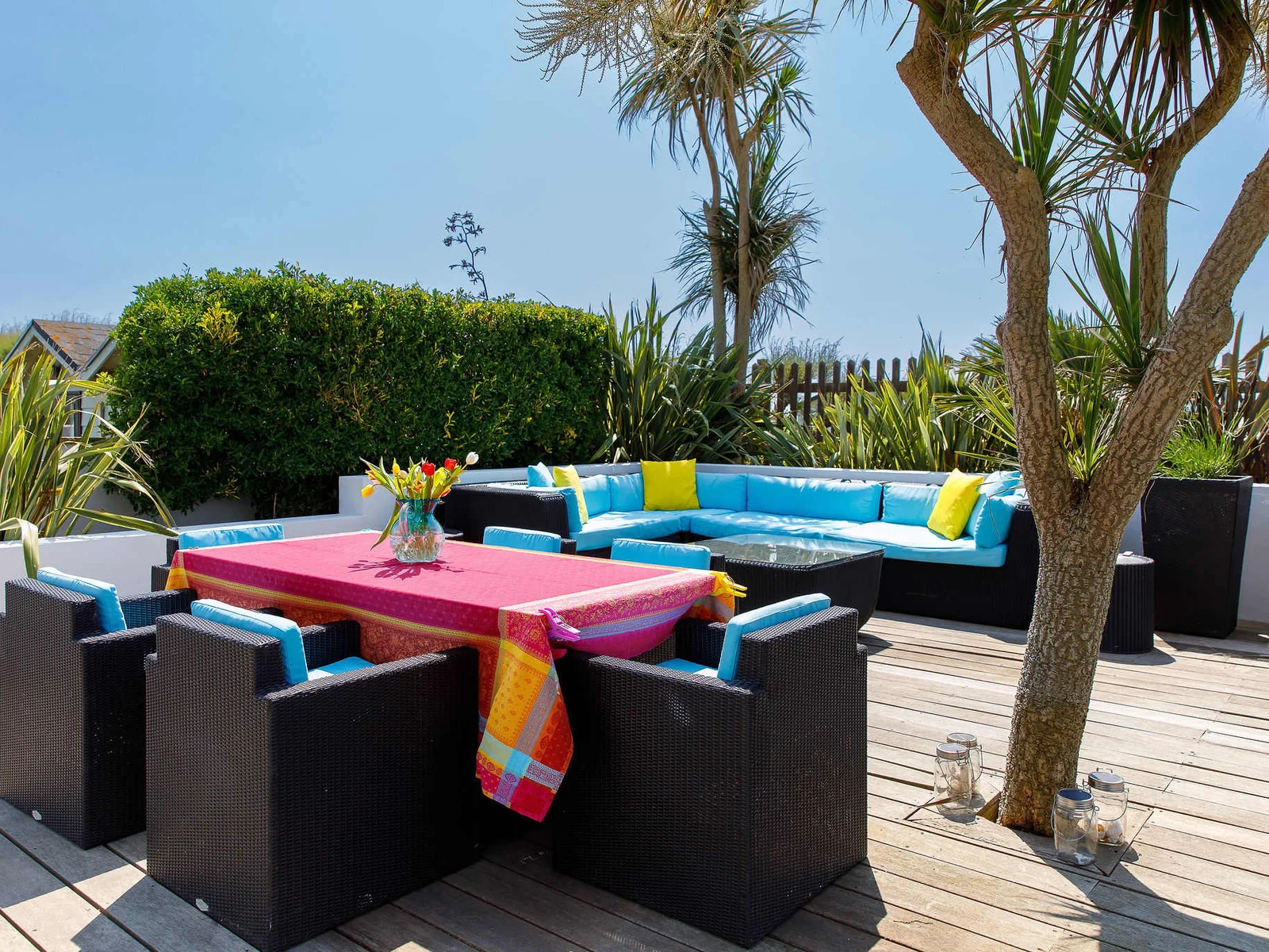 The outside area has huge decking with plenty of seating both in the shade and sun.