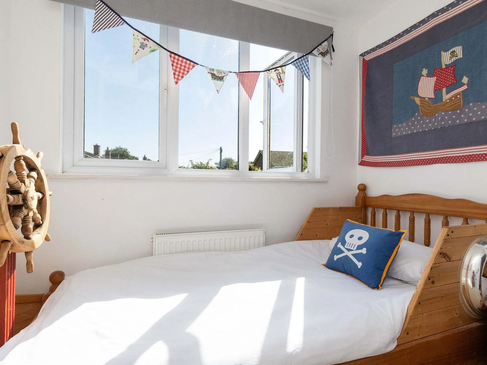 Spark imaginations in this exciting nautical bedroom, perfect for a memorable family getaway.
