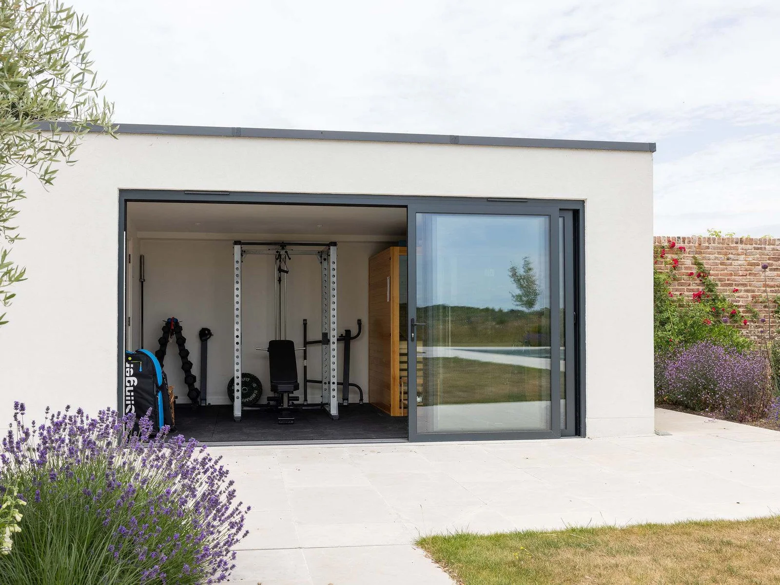 Private gym with sliding doors to the garden – stay fit with a view