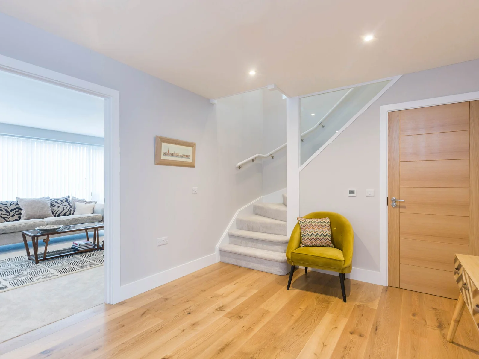 The smart staircase guides guests to the equally impressive upper floor.