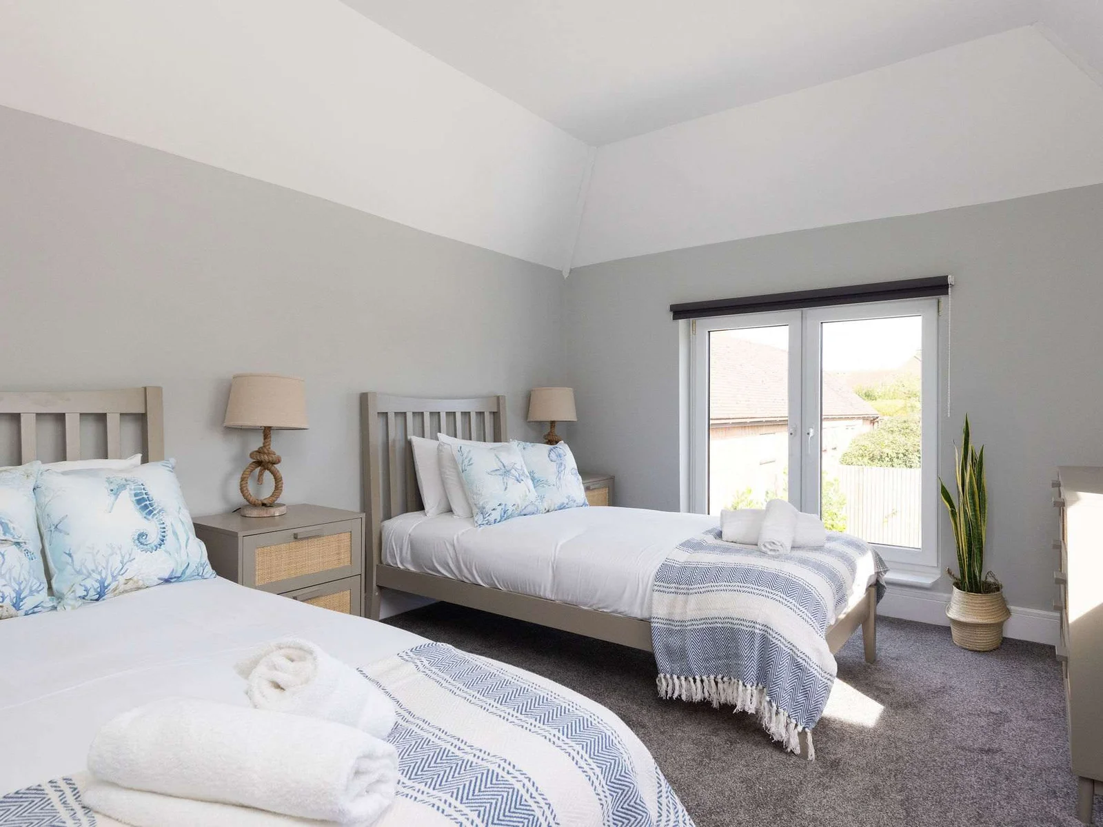 Bright and airy twin room, flooded with natural light.