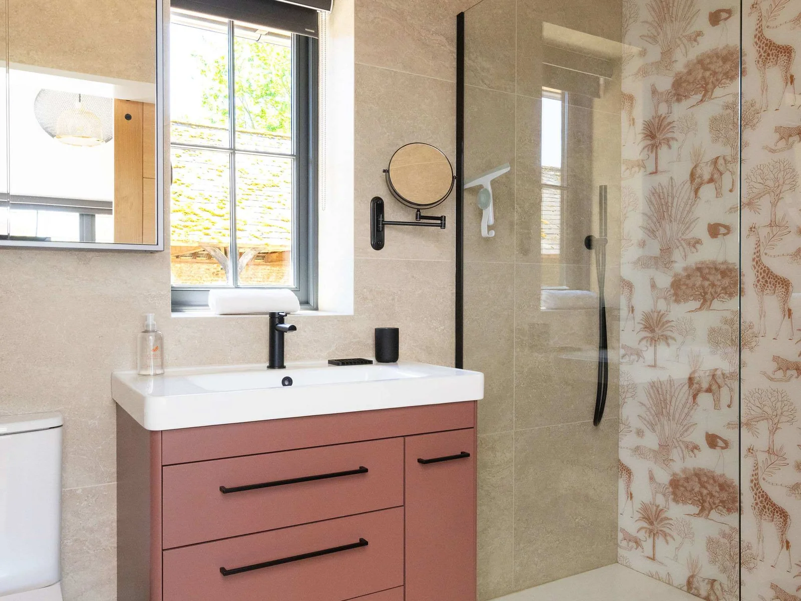 Refresh in a warm modern bathroom with walk-in shower, soft textures, and relaxed countryside lodge style.