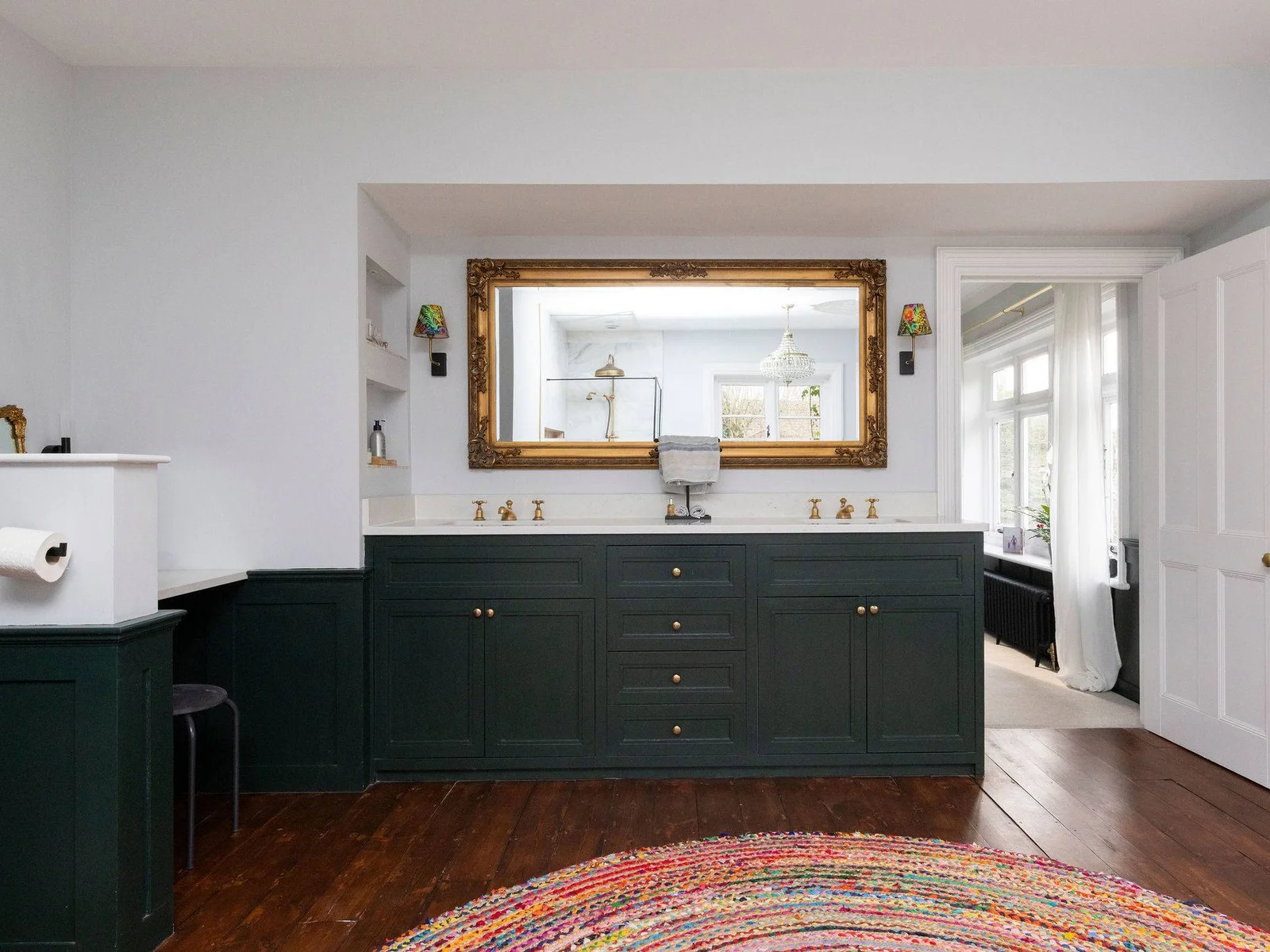 A vintage-inspired vanity with elegant gold details