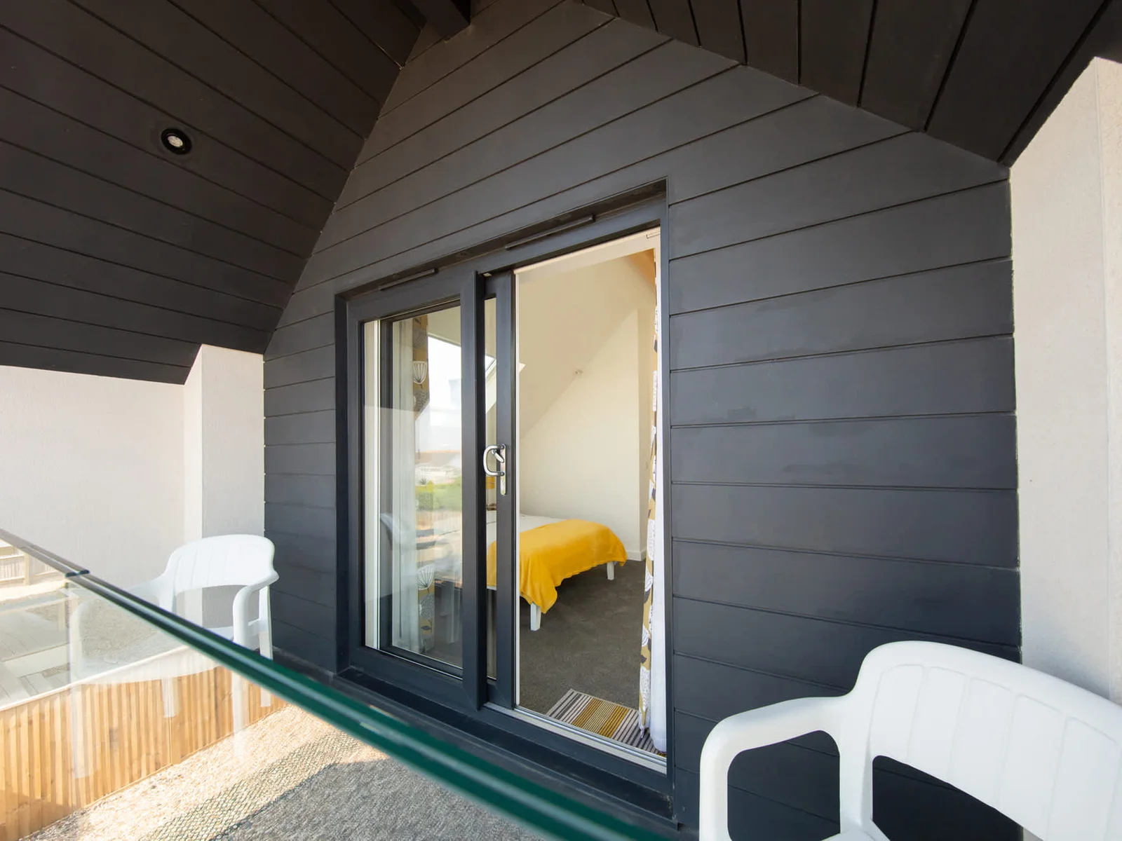 Covered balcony allows you to enjoy the outdoors even if the weather isn't sunny