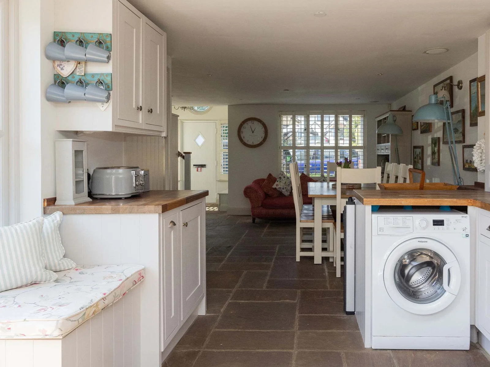 Open-plan kitchen flowing into a sociable dining and living space