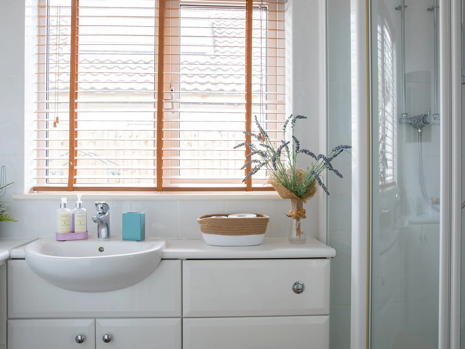 Ground floor king bedroom provides direct access to its ensuite bathroom.