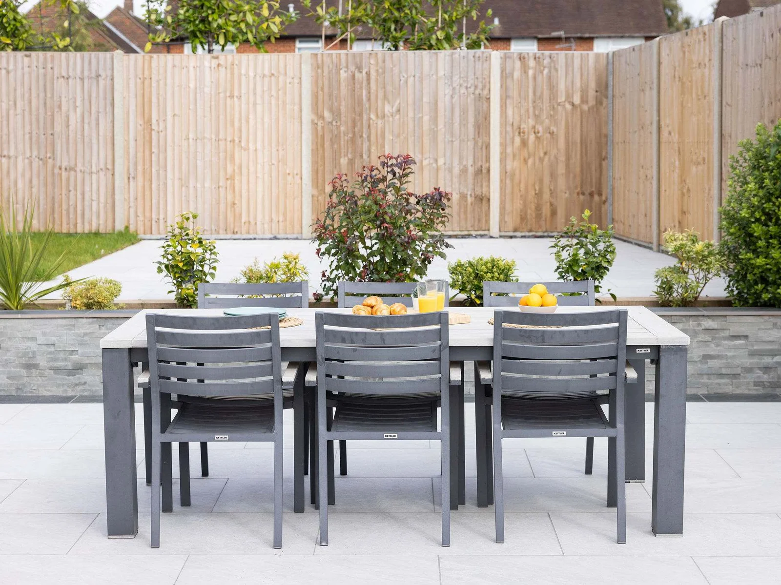 A dedicated outdoor dining space within your own private garden.