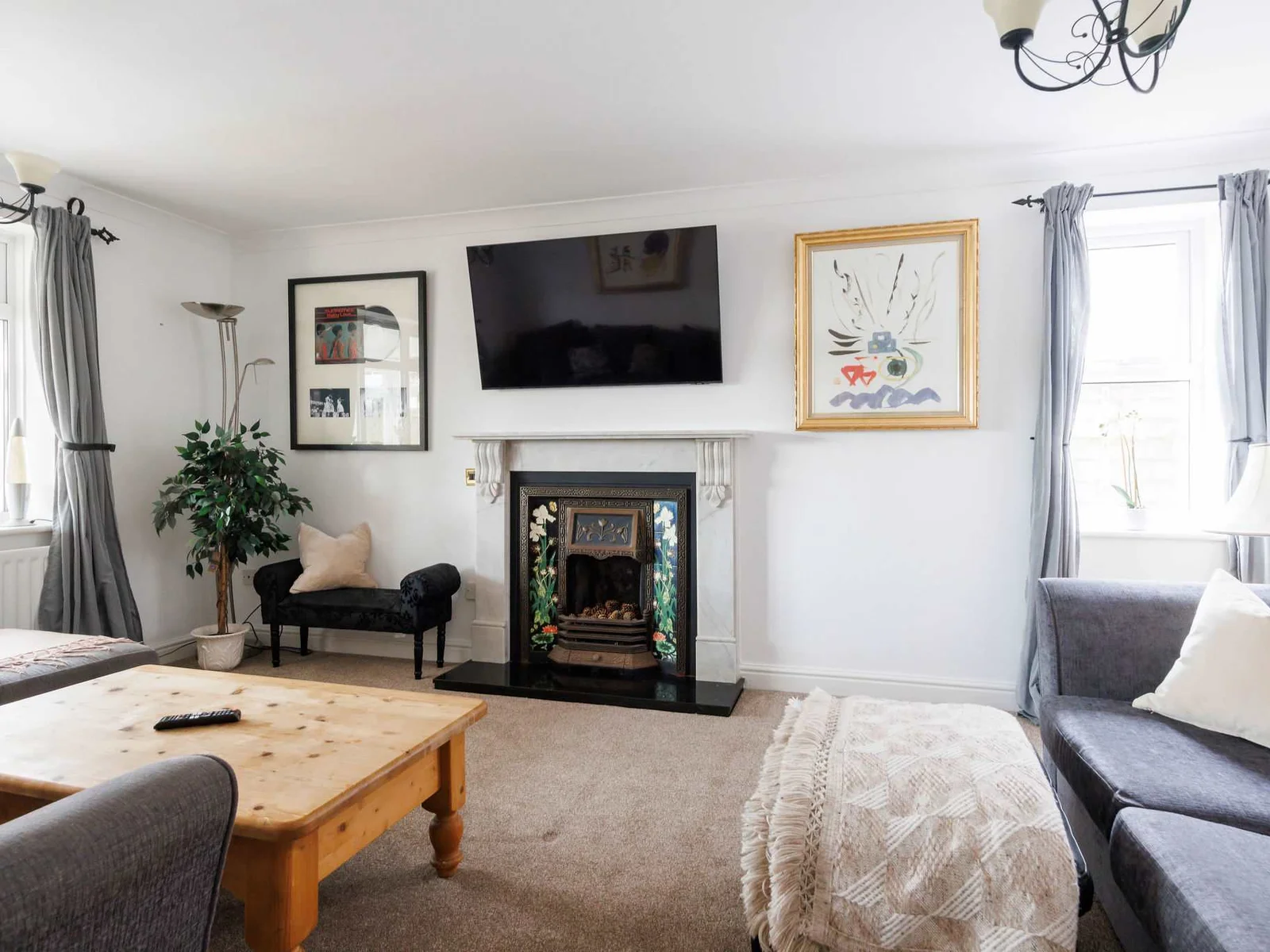 Cosy throws and cushions create a relaxing lounge to retire to after dinner.