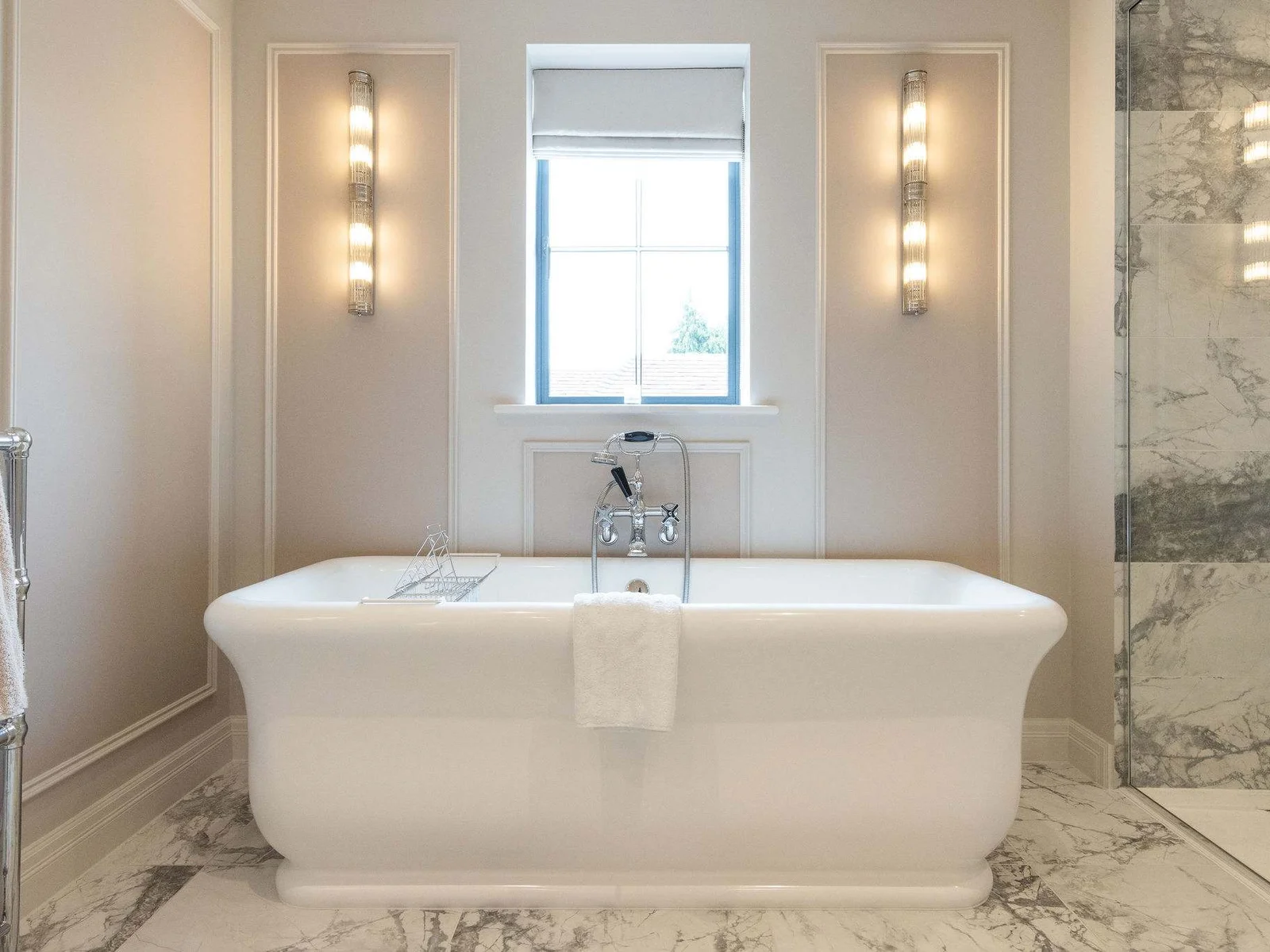 A tranquil retreat with deep tub and soft lighting for ultimate relaxation
