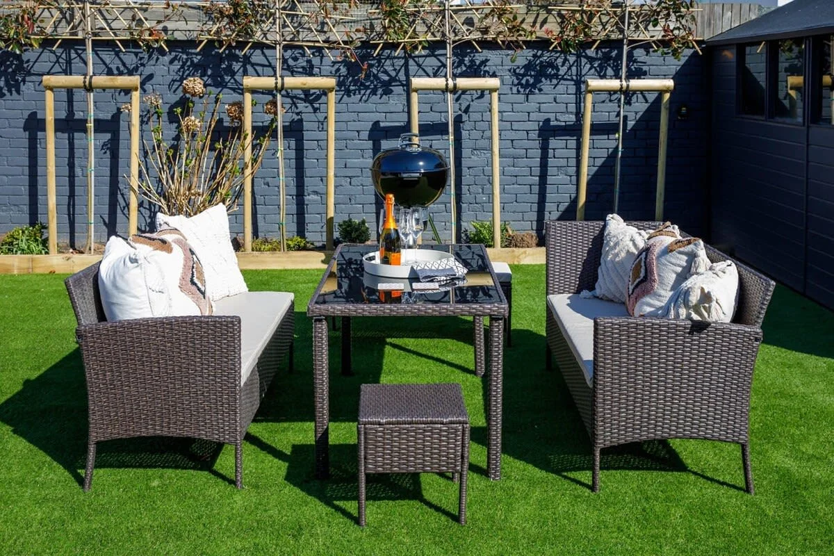 The outdoor table and chairs, perfect for entertaining.
