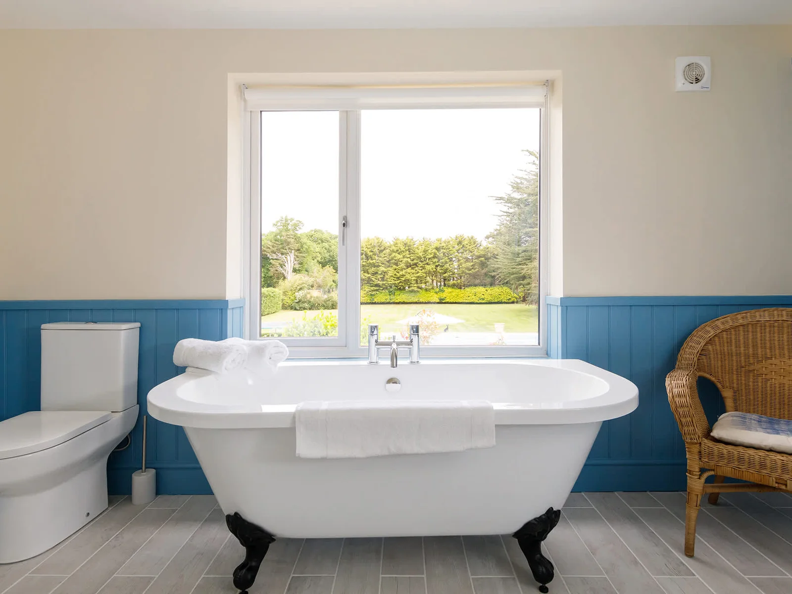 There are four beautiful bathrooms, some with garden views..