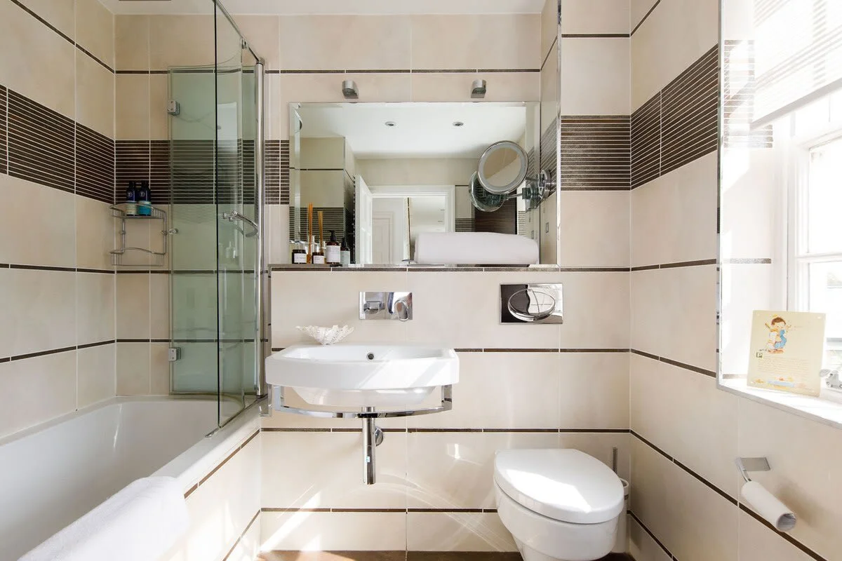 There is total of three bathrooms plus downstairs cloakroom, so no one will be waiting their turn to get ready in the morning.