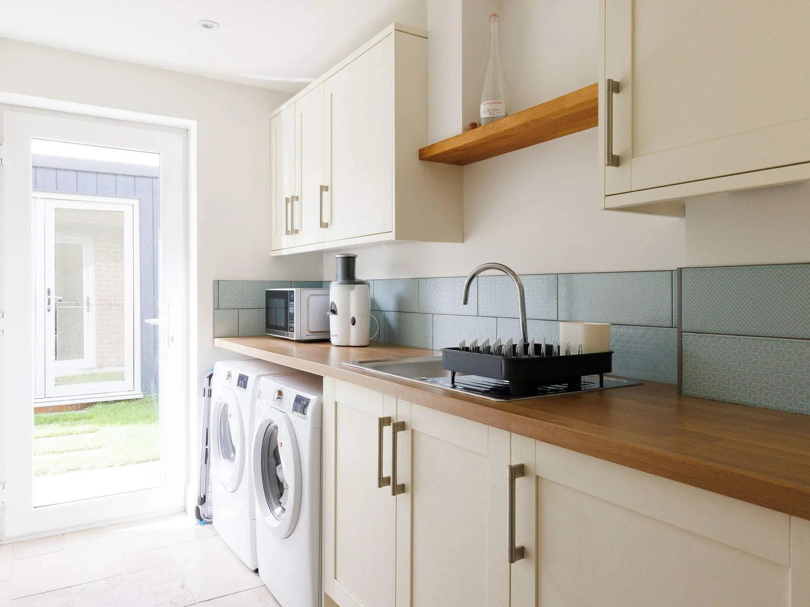 The separate utility room has everything you need to keep on top of washing and plenty of worktop space to organise bags for trips out.