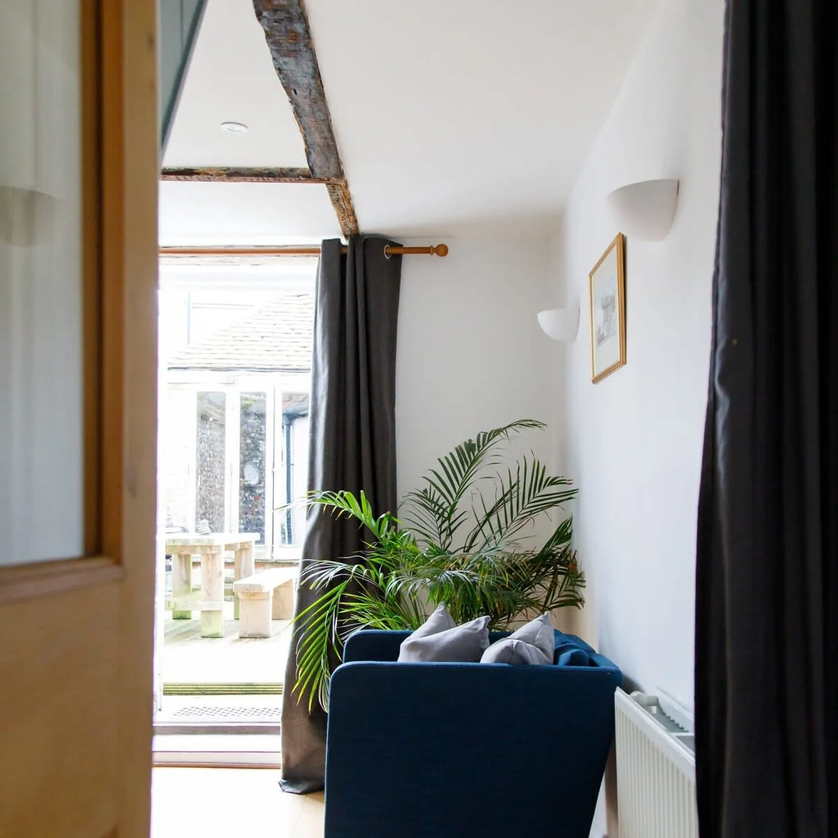 The Grade II listed townhouse has character charm, with exposed beams and wooden flooring.