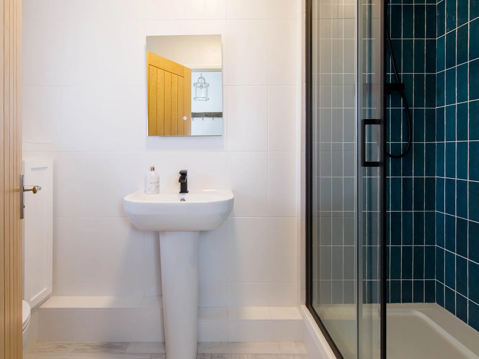 There is a handy downstairs shower room with WC and sink.