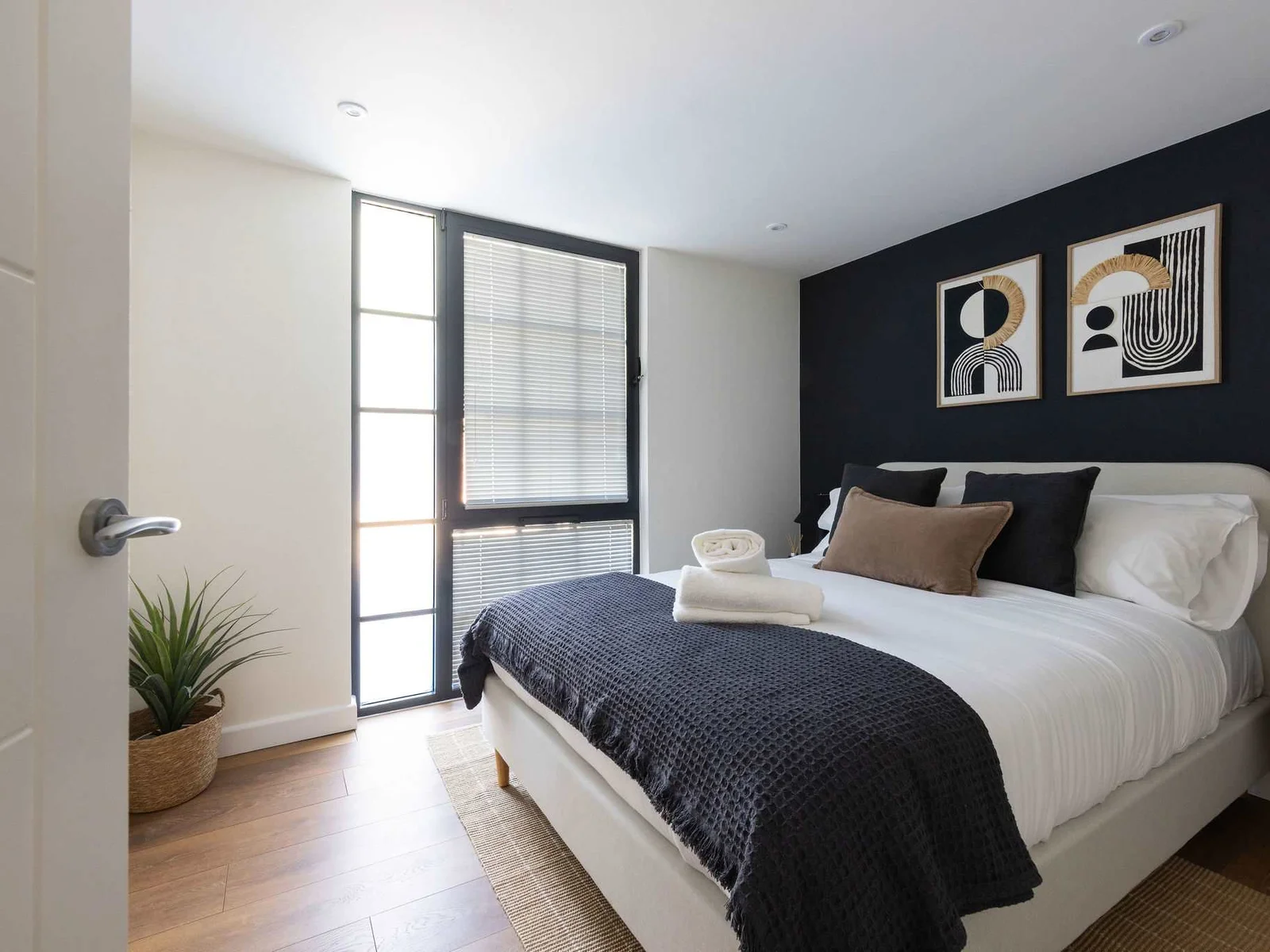 Modern double bedroom offering a peaceful retreat after exploring Chichester and the nearby coast.