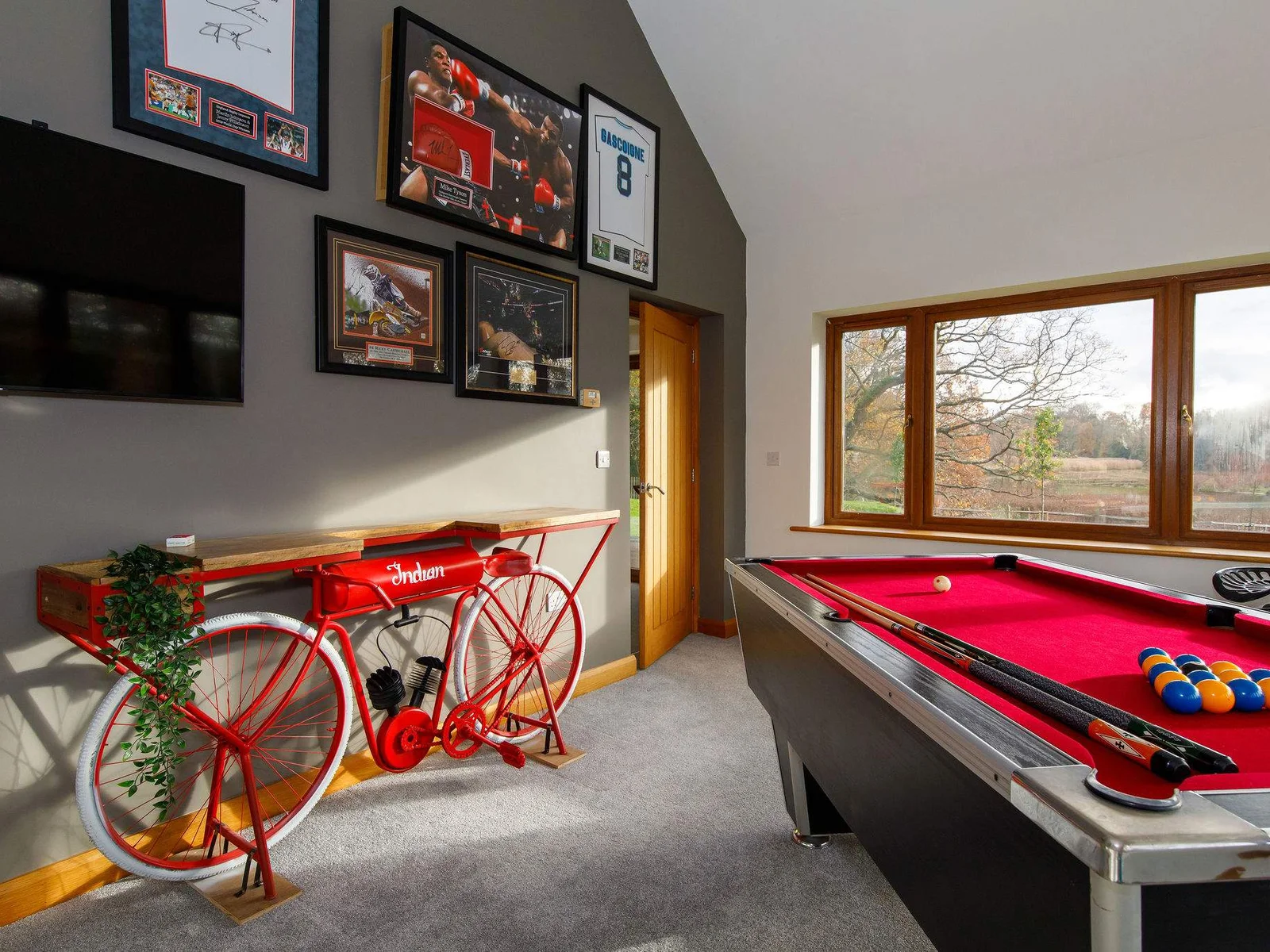 The home has an amazing games room with pool table and television overlooking the river.