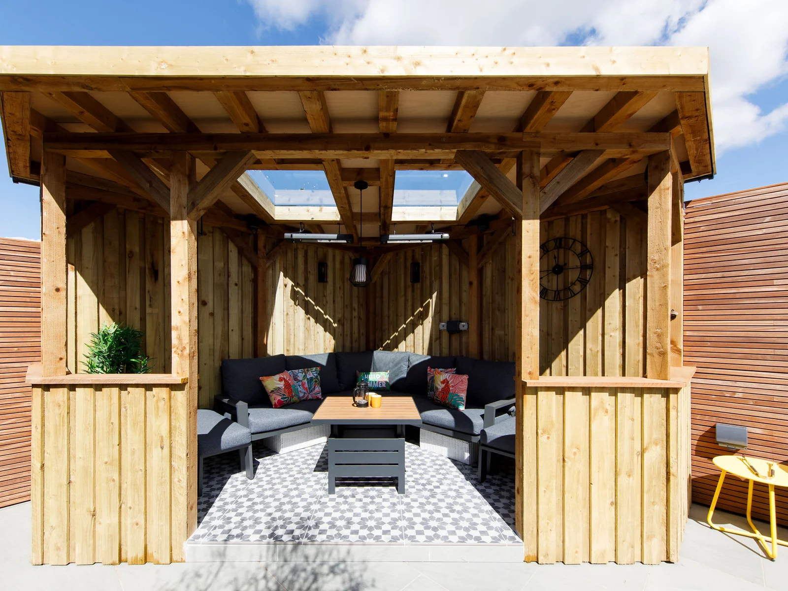 The outdoor are vastly extends the living space of this home, giving area to relax, eat and unwind away from the main house.