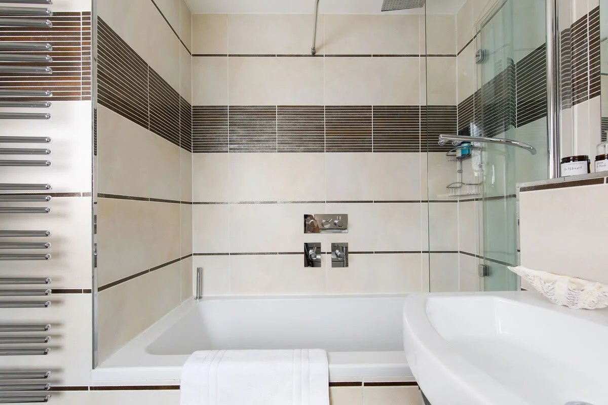 Soak in the bath after a day exploring the area.