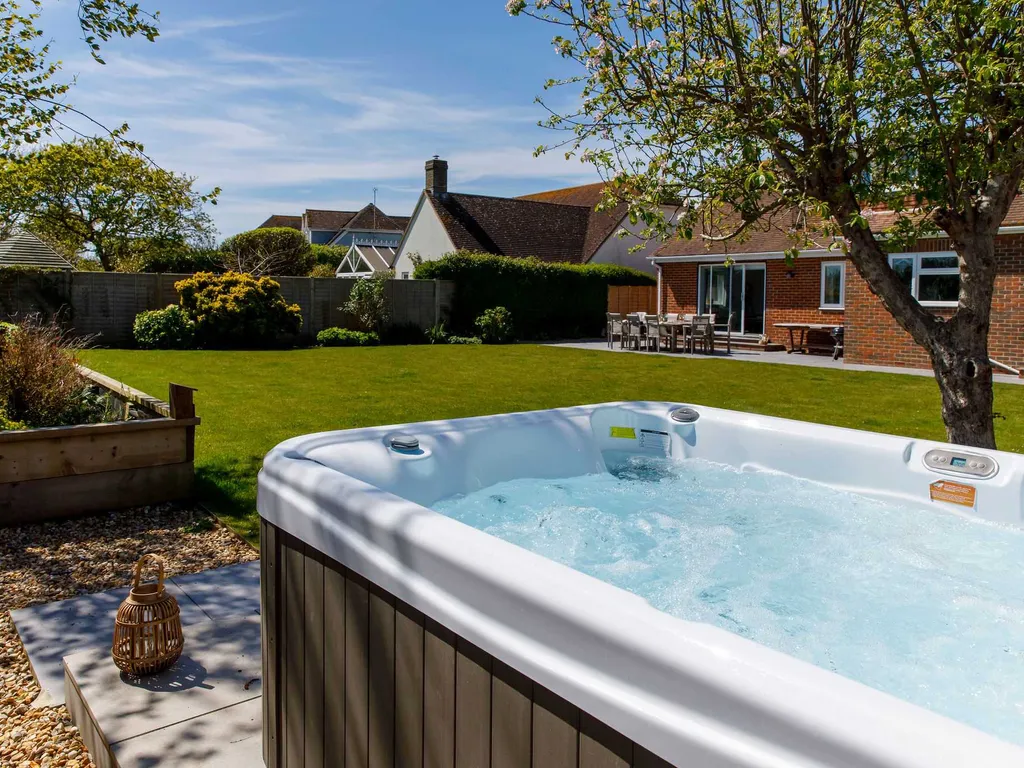 Coastal Retreat for 8 with Hot Tub – Walk to Beach