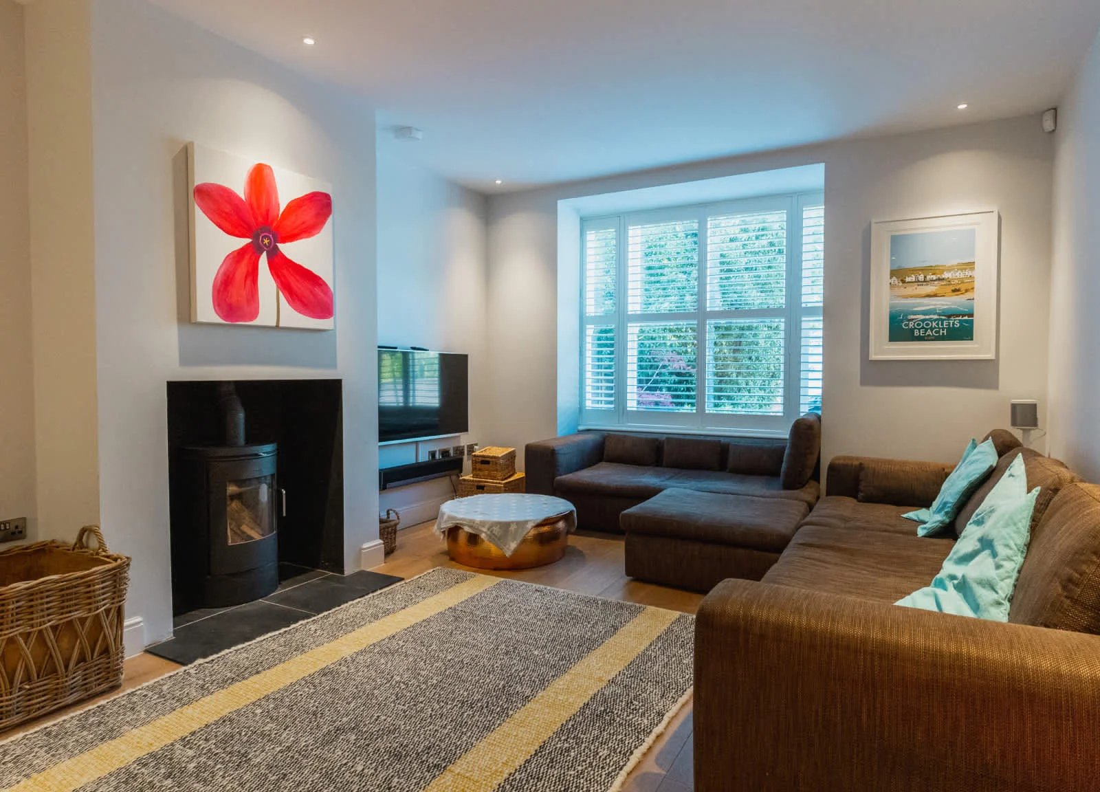 Sink into comfy seating and unwind in the separate lounge with log burner.